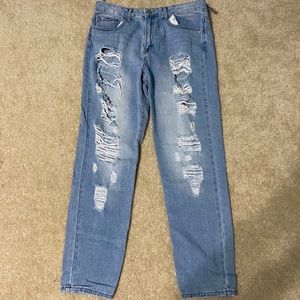 Ripped, slightly cropped jeans.